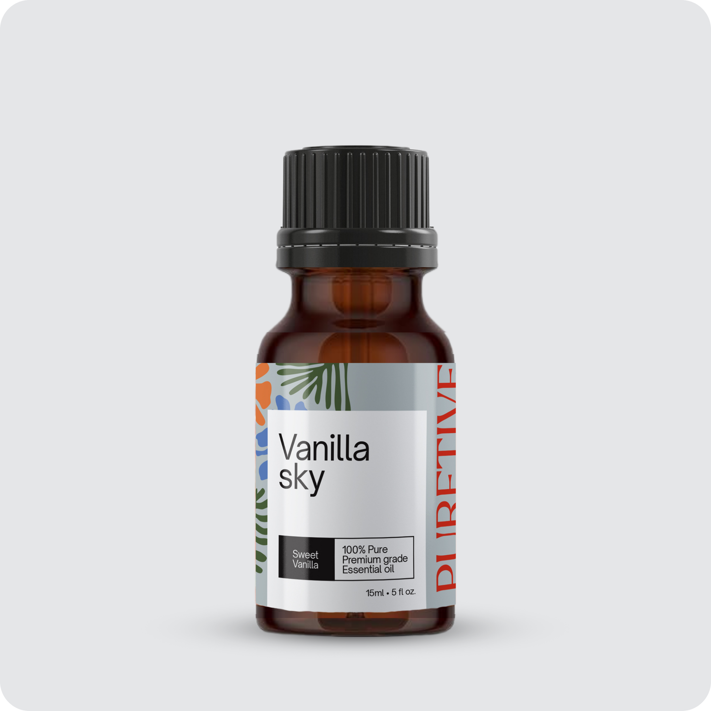 Amber glass essential oil bottle with "Vanilla Sky" label.