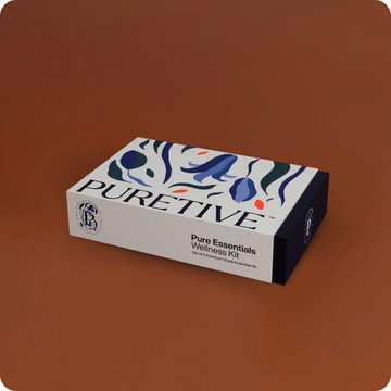 A boxed Puretive wellness kit with abstract design on a brown background.