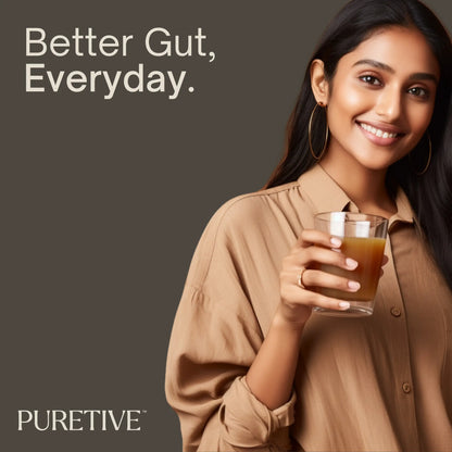 Picture of a woman in her mid 20's enjoying a sip of Puretive's Gut Guard Nutrition Mix as her daily ritual to keep her gut healthy
